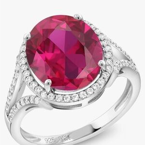 Ruby 5-7 Cttw, lab created, oval halo 925 silver ring. 12x10mm. Size 9.
